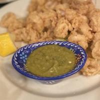 Calamari Fritos · Fried calamari, avacado salsa dip.