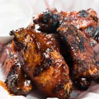 Smoked Wings · House Smoked Wings served with Home Made Buttermilk Ranch.