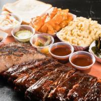Double Ribs Platter · Full Slab Ribs, add one meat and your choice of 3 sides.