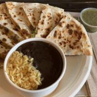 Grilled Steak Quesadilla · Grilled skirt steak, Monterey Jack and Cheddar with cilantro in a flour tortilla. Rice and b...
