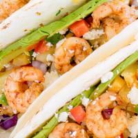Grilled Shrimp Taco · Grilled shrimp, lettuce, pico de gallo and queso fresco in a double corn tortilla. Add guaca...