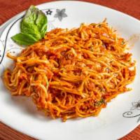 Spaghetti Ala Vodka · Spaghetti style pasta beaded with
famous vodka sauce.