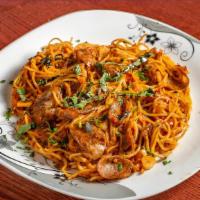 Meat Sausage Spaghetti · Spaghetti style pasta beaded with
warm sausage and marinara sauce.