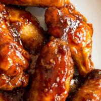 Bbq Wings · Traditional bone-in wings,Hand-tossed in your choice of sauce or rub. Choose your flavors!