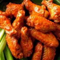 Original Buffalo Wings · Traditional bone-in wings, hand-tossed in your choice of sauce or rub. Choose your flavors! ...