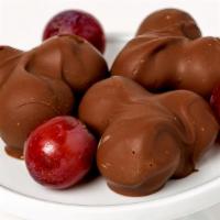 Chocolate Covered Grapes · Fresh David Bradley chocolate covered red seedless grapes. Experience grapes in a new way co...