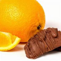 Chocolate Covered Oranges · 1 pound or half pound of chocolate covered oranges in milk, dark or a mix of milk and dark.