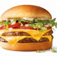 Supersonic® Double Cheeseburger · Lettuce, Pickle, Tomato, Onion, Mayo and Ketchup. Comes with cheese.