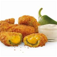 Ched ‘R’ Peppers® · Spicy jalapeños filled with melted cheddar cheese, breaded and fried to perfection.
