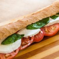 Capri Sandwich · Organic fresh mozzarella PDO, organic tomatoes, fresh basil and extra virgin olive oil.