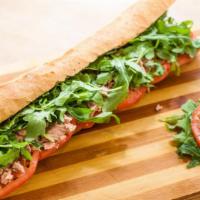 Amalfi Sandwich · Italian tuna in olive oil, organic arugula, organic tomatoes, and extra virgin olive oil.