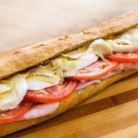 Carciofo Sandwich · Prosciutto Cotto PDO, Fresh Mozzarella, Organic Tomatoes and organic artichoke hearts.