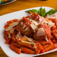 Penne Pasta With Beef Meatballs And Tomato Sauce, Basil And Parmigiano · Penne Pasta with Beef Meatballs and Tomato Sauce, basil and parmigiano