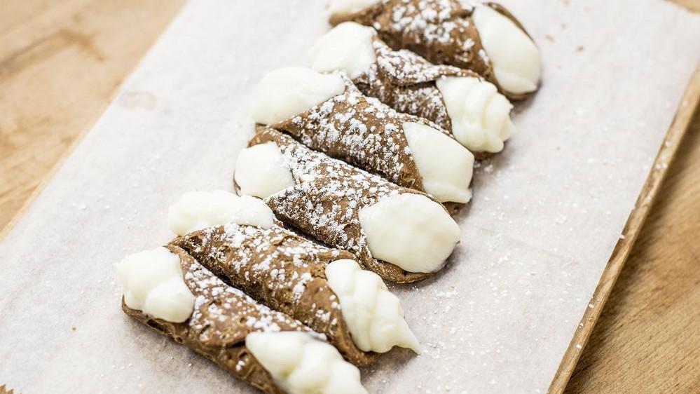 Cannolo · Filled with sweetened Italian ricotta cheese cream.