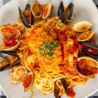 Linguine Del Mar · Clams, mussels, shrimp, and calamari. With red or white sauce.