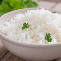 White Rice · White rice cooked with the Dominican Style.