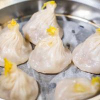 Shanghai Steamed Crab Meat & Pork Juicy Dumplings · Six pieces. Dim sum and small eat.