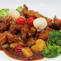 Gu-Lu Pork With Pineapple · Sliced pork tenderloin fried till crispy, then sauteed with lychee, pineapple, and cherry in...