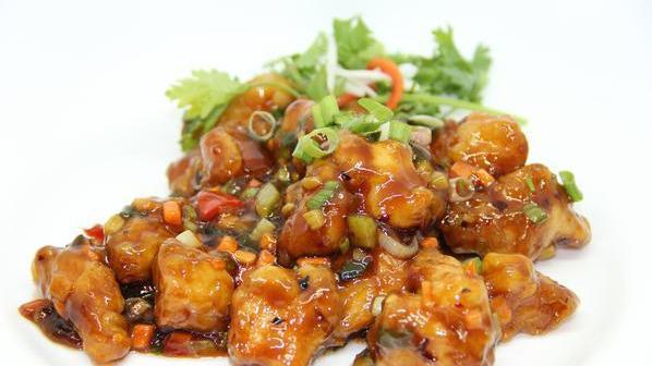 Chan-Do Chicken · Chicken breast cut into 1 inch cubes marinated with chinese spices, first fried till crispy, tender and then sauteed with celery, carrot, and scallion.