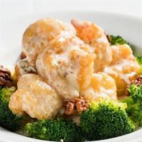 Grand Marnier Prawns · Prawns coated with water chestnuts flour, cooked till crispy, then sautéed in a grand marnie...