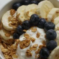 Build Your Own Greek Yogurt Bowl · Plain 2% Greek yogurt base. Topped with vanilla almond granola, banana, and your choice of t...