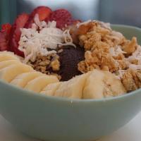 Young And Reckless Bowl · Açaí blended with almond milk. Topped with vanilla almond granola, banana, strawberries, pea...