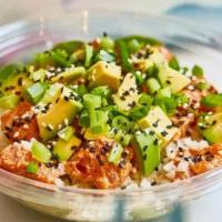 Kani Salad Poke Bowl · Imitation crab meat poke over choice of rice, toast or spinach, topped with avocado, scallio...