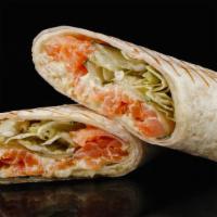 The Fish Gyro · Fresh fries sliced and added on warm pita bread filled with lettuce, diced tomatoes, onions ...