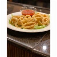 Fried Calamari · A generous portion of calamari fried to perfection, served with a side of marinara.