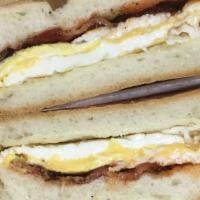 B E C · Bacon, two eggs & yellow american cheese. Poppy seed roll by default if no other option is s...