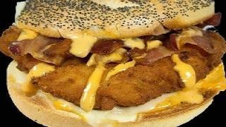Cluckin Russian · Breaded chicken cutlet, muenster cheese, bacon, and Russian dressing.