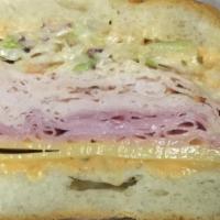 All American · Turkey breast and ham, swiss cheese, coleslaw, russian dressing. Poppy seed roll by default ...