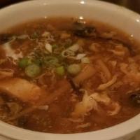 Qing'S Famous Hot & Sour Soup - Large · Rich & tangy broth with tofu, black wood ear mushroom, shredded bamboo shoots, mushroom, egg...