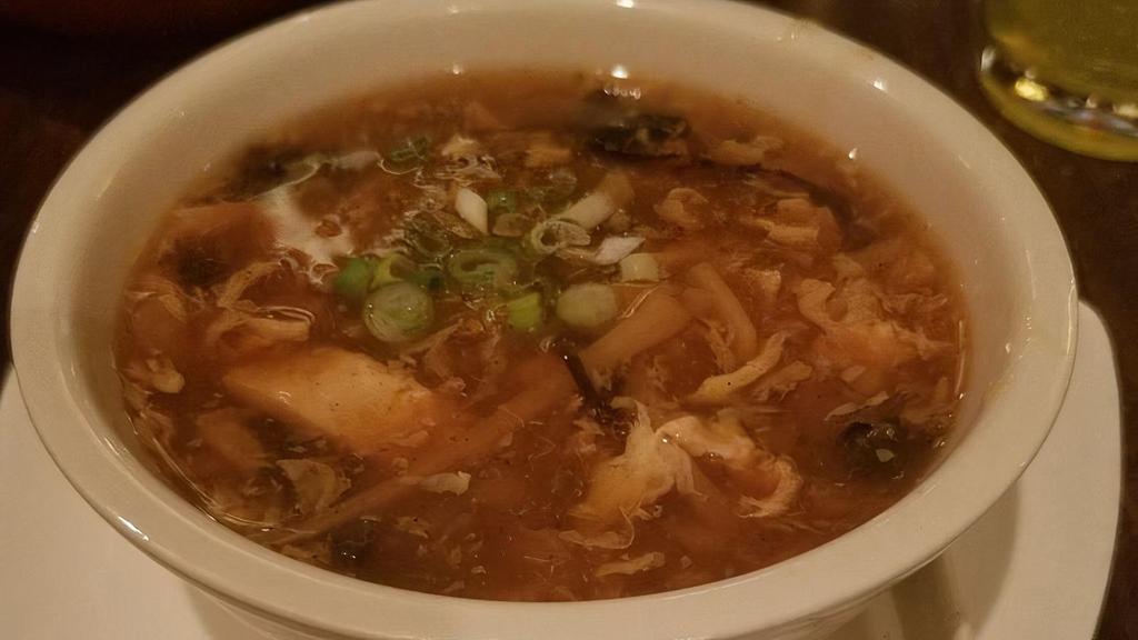 Qing'S Famous Hot & Sour Soup - Small · Rich & tangy broth with tofu, black wood ear mushroom, shredded bamboo shoots, mushroom, egg drop and ground black pepper. Spicy