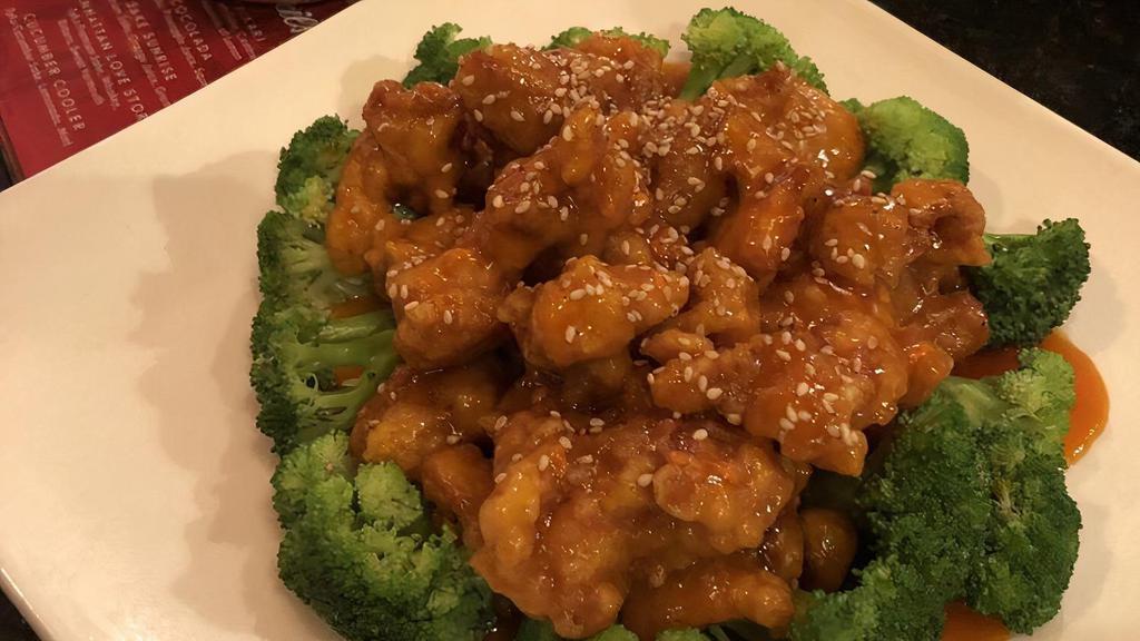 Sesame Chicken · Lightly battered fried chicken, wok tossed in sesame sauce, served with steamed broccoli.