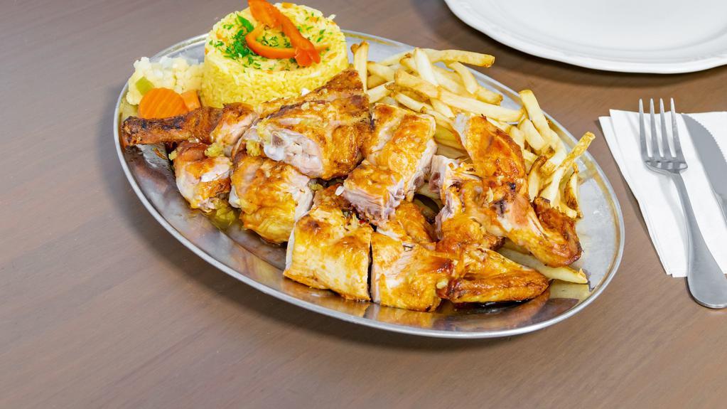 Whole Chicken · CHARCOAL GRILLED CHICKEN SERVED WITH TWO OPTIONS OF SIDES