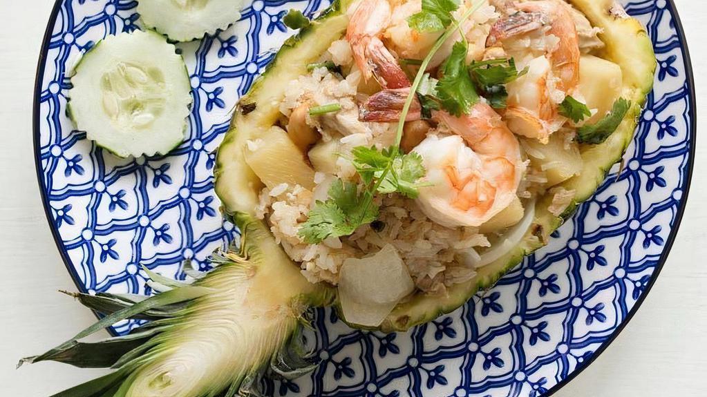 Pineapple Fried Rice · Comes with chicken and shrimp.