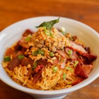 Bamee Poo Moo Dang · Soft thin egg noodles topped with caramelized pork and crab meat, steamed bok choi (served d...