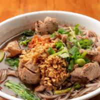 Num Tok · Rice noodles with pork blood broth comes with pork, pork meatballs, Chinese broccoli, bean s...