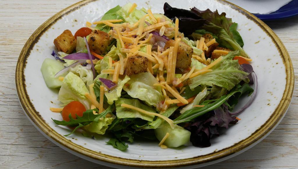 Side Garden Salad · Fresh Greens, Grape Tomatoes, Cucumber, Red Onion, Croutons, Cheddar Cheese.