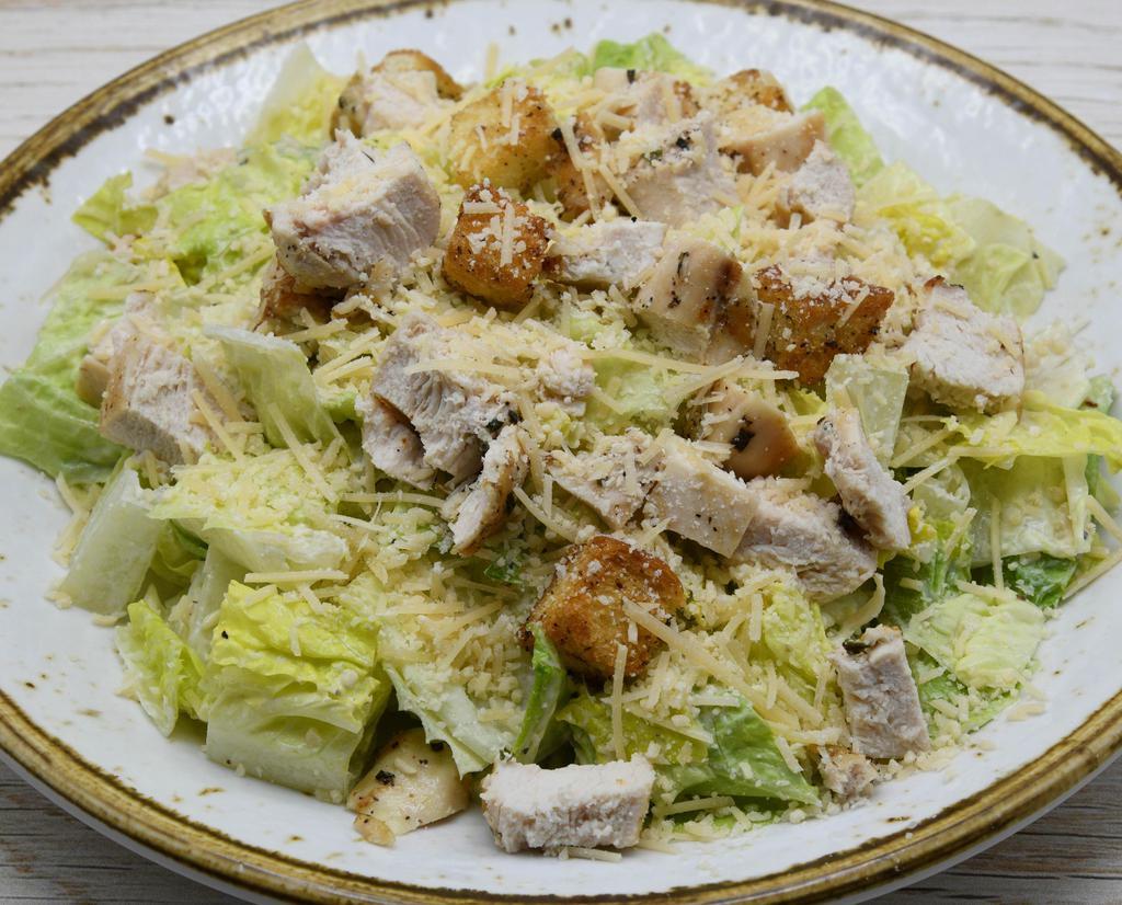 Chicken Caesar Salad · Grilled Chicken Breast, Parmesan Cheese, Baked Croutons.