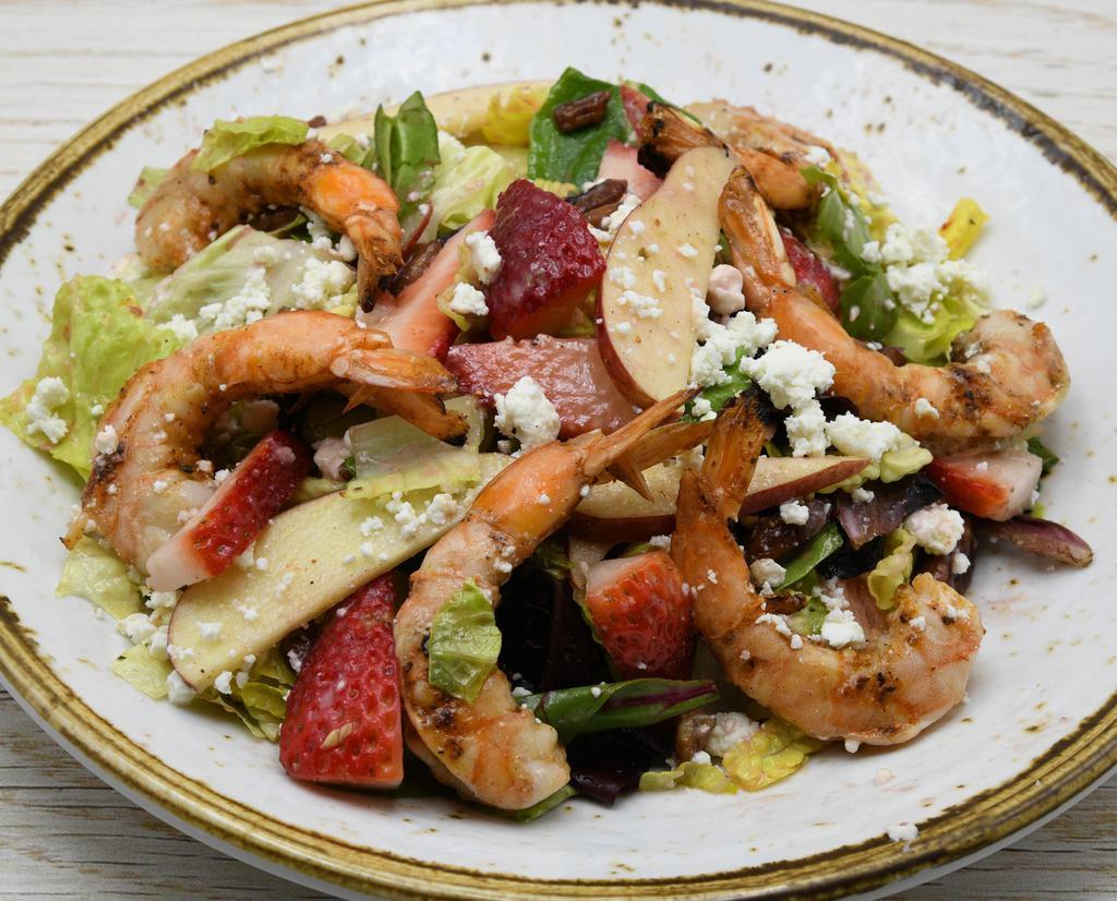 Strawberry Shrimp Salad · Mixed Greens, Grilled Shrimp, Strawberries, Apples, Raspberry Vinaigrette, Feta Cheese, Glazed Pecans.