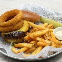 Bbq Cheeseburger · Lettuce, Tomato, Cheddar Cheese, BBQ Sauce topped with Onion Rings, Fries.