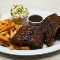 Dixie Style Baby Back Ribs · Baby Back Ribs, Coleslaw, Fries, BBQ Sauce.