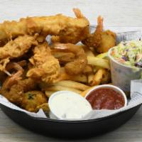 Forrest’S Seafood Feast · Fish & Chips, Fried Shrimp, Seafood Hush Pups, Fries, Coleslaw, Tartar Sauce, Chili Ancho Ai...