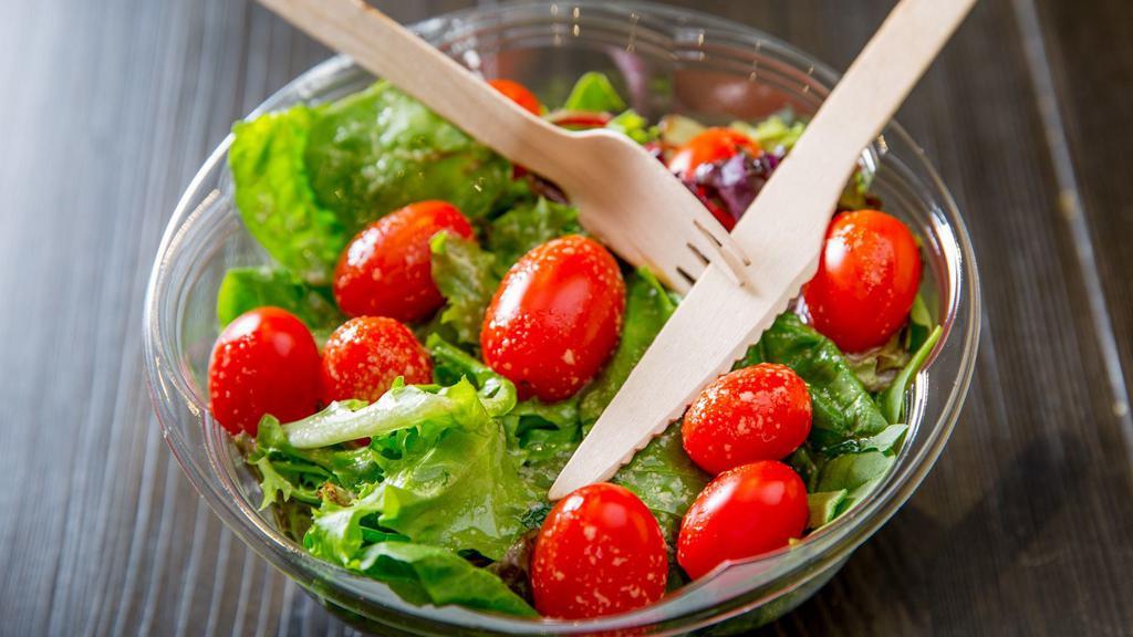 House Salad · Mini tomatoes and house vinaigrette. Made with mesclun mix.