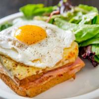 Croque Madame · White bread with bechamel sauce, French ham and melted Swiss cheese topped with 1 egg sunny ...