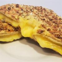 Grilled Cheese · American & muenster cheese melted on a toasted bagel or a multigrain roll and choice of side.