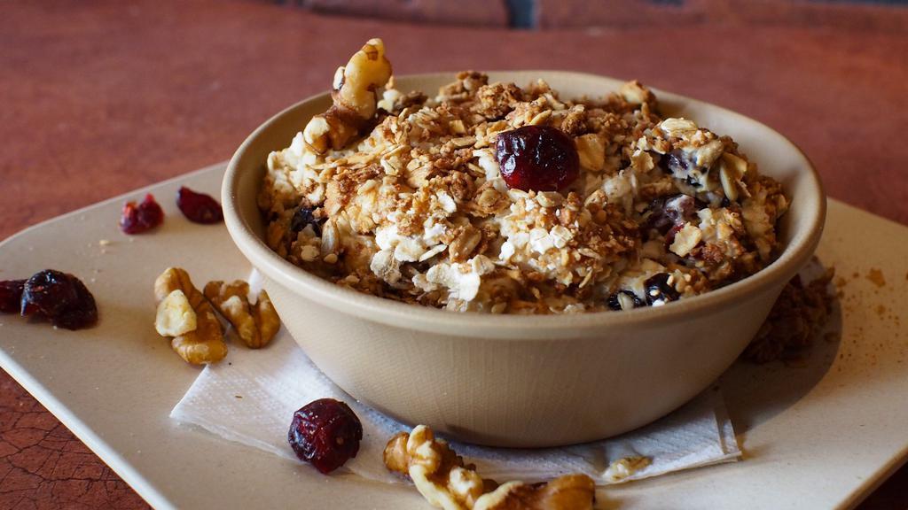 Oatmeal (Plain) · CINFULLY BANANA - Hot oatmeal cooked with milk & vanilla with sliced fresh bananas, crushed walnuts & sprinkled with cinnamon. 
CRANBERRY GRANOLA - Hot oatmeal with dried cranberries and crunchy granola.