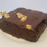 Brownie · A fudgy, gooey brownie topped with fudge icing and a walnut.